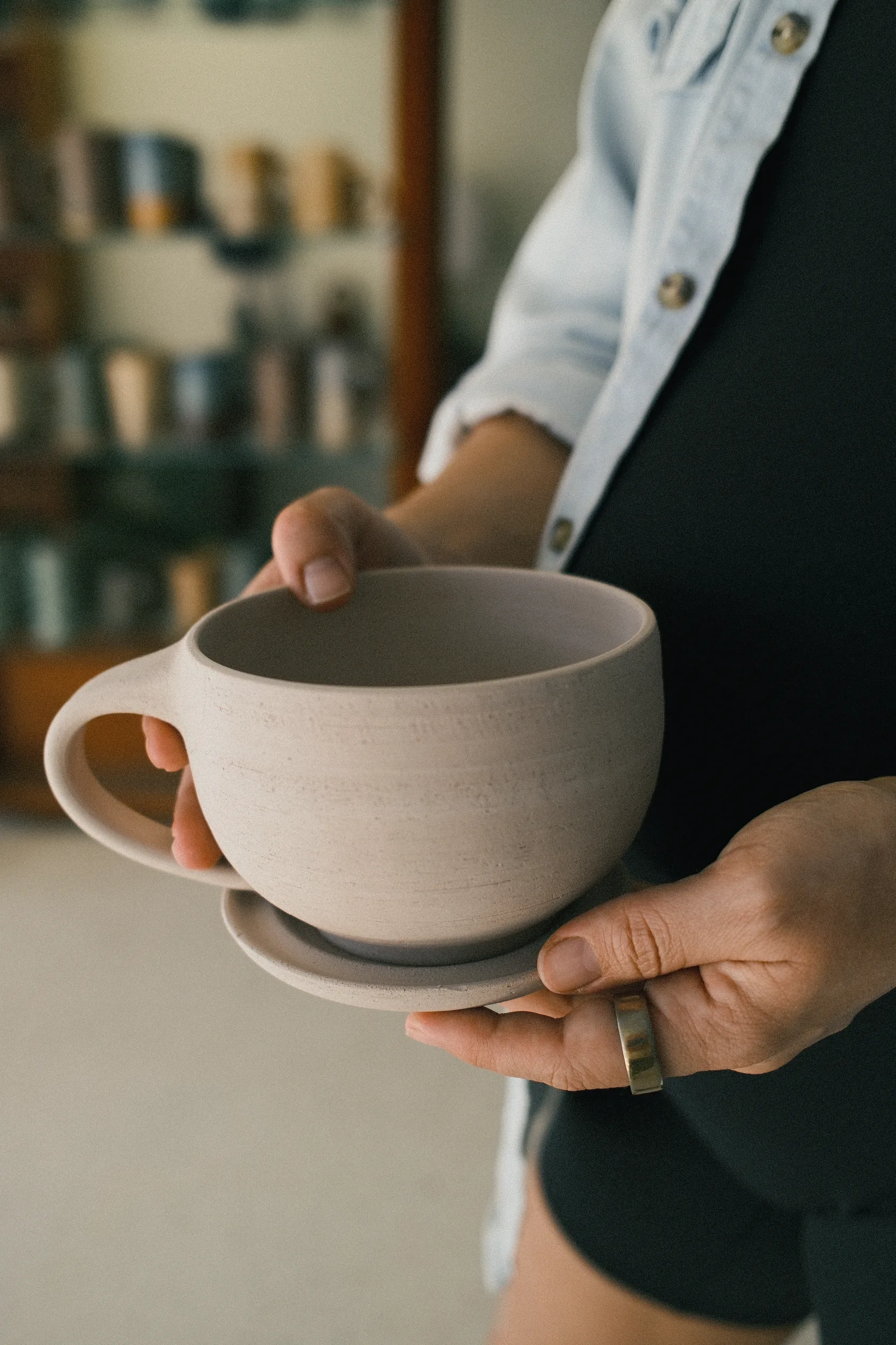 Cappuccino cups and saucers made in a Floridian Ceramics workshop